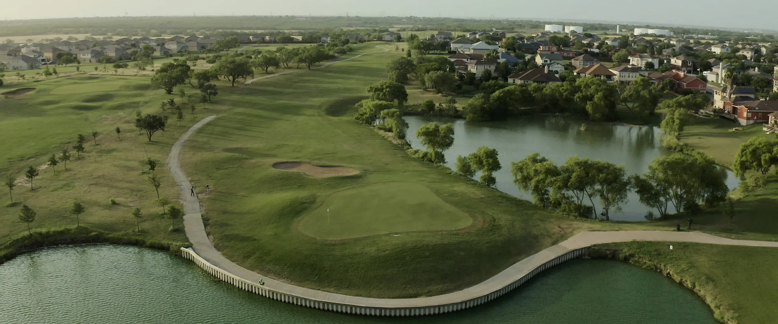 An aerial view of a golf course in Misson del Lago.