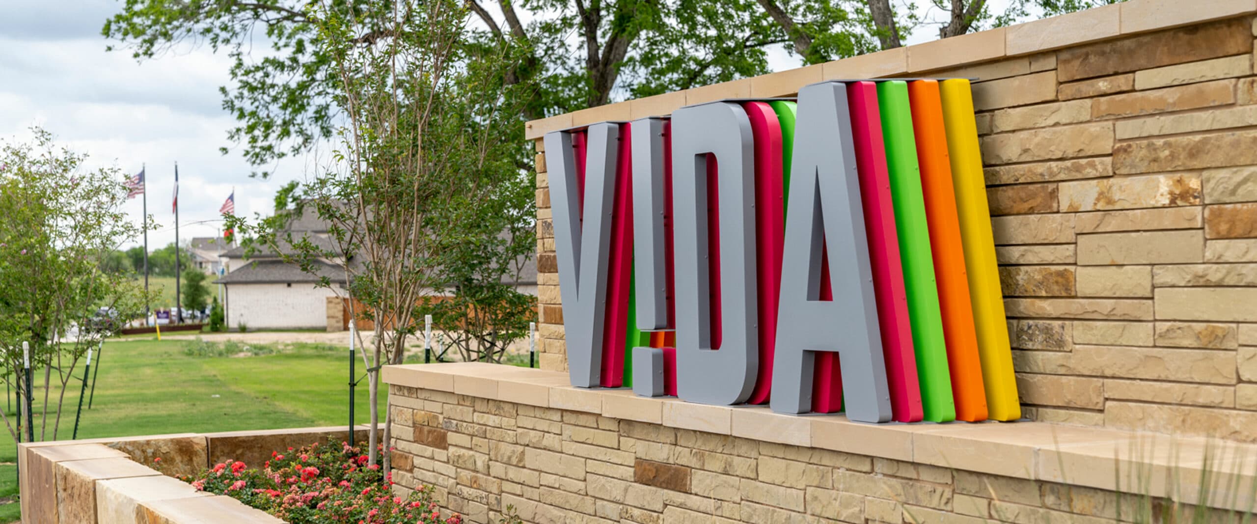 A colorful Vida community entrance sign